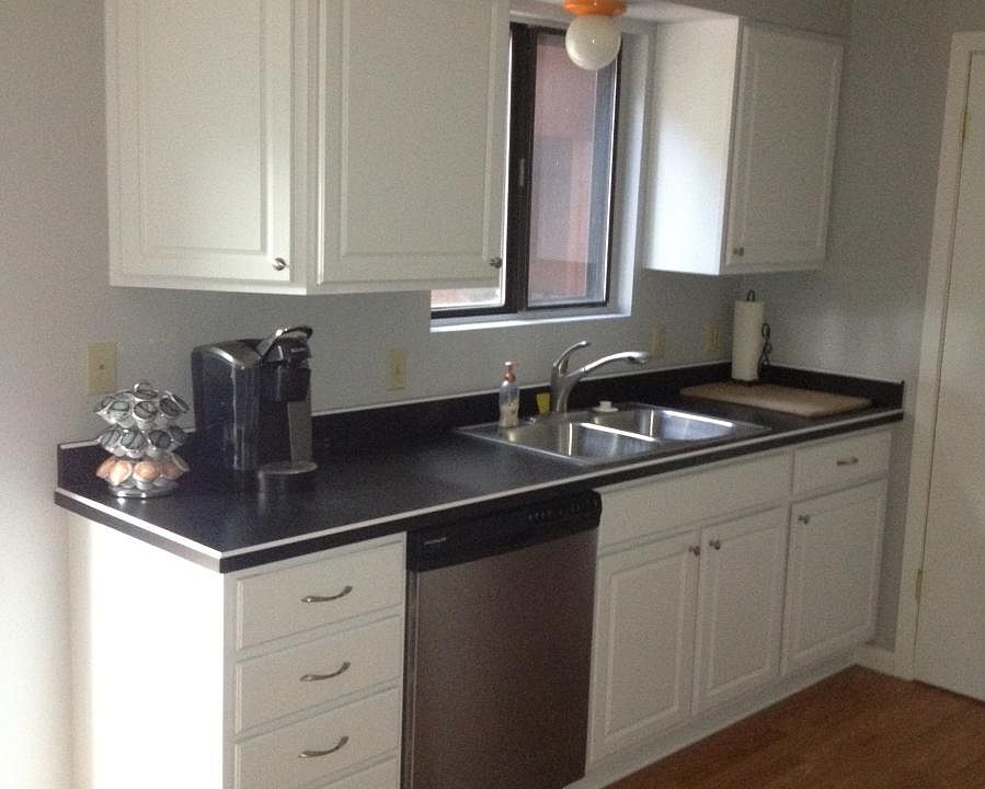 Easy to clean and maintain laminate floors throughout lower