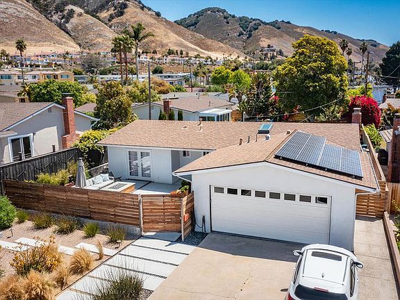 2 car garage and 2 parking spaces on the driveway. Solar power means near zero electricity costs.