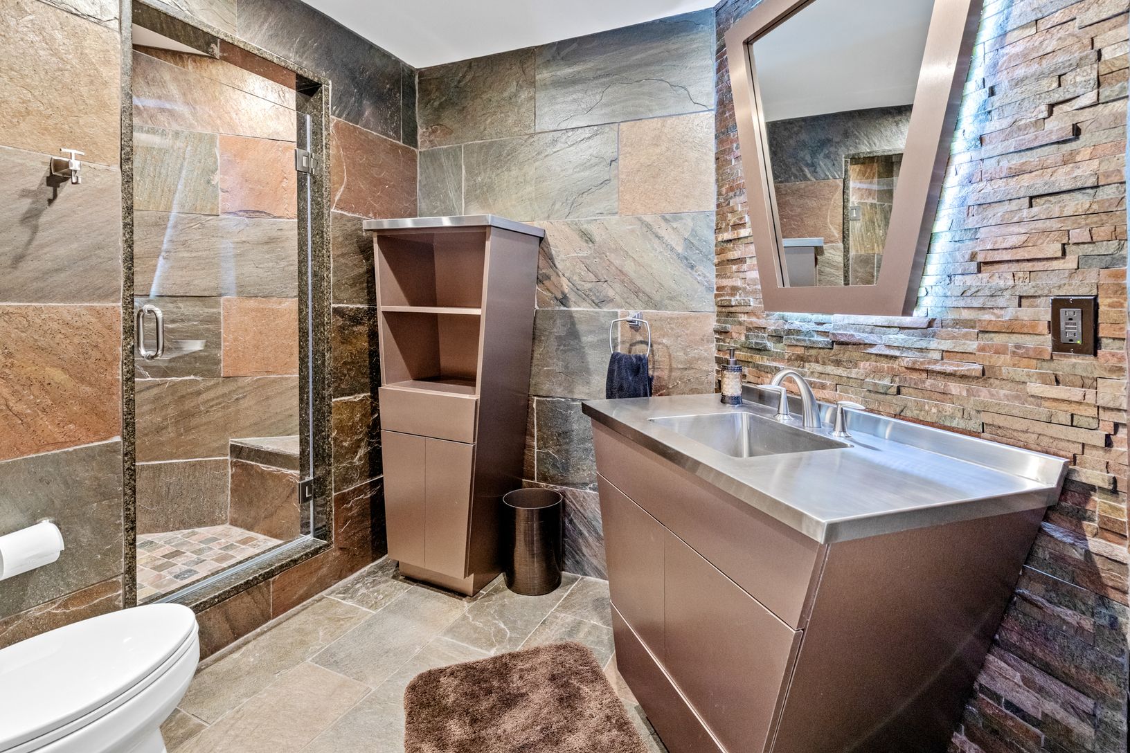  full bathroom on the lower level with the gym and media room