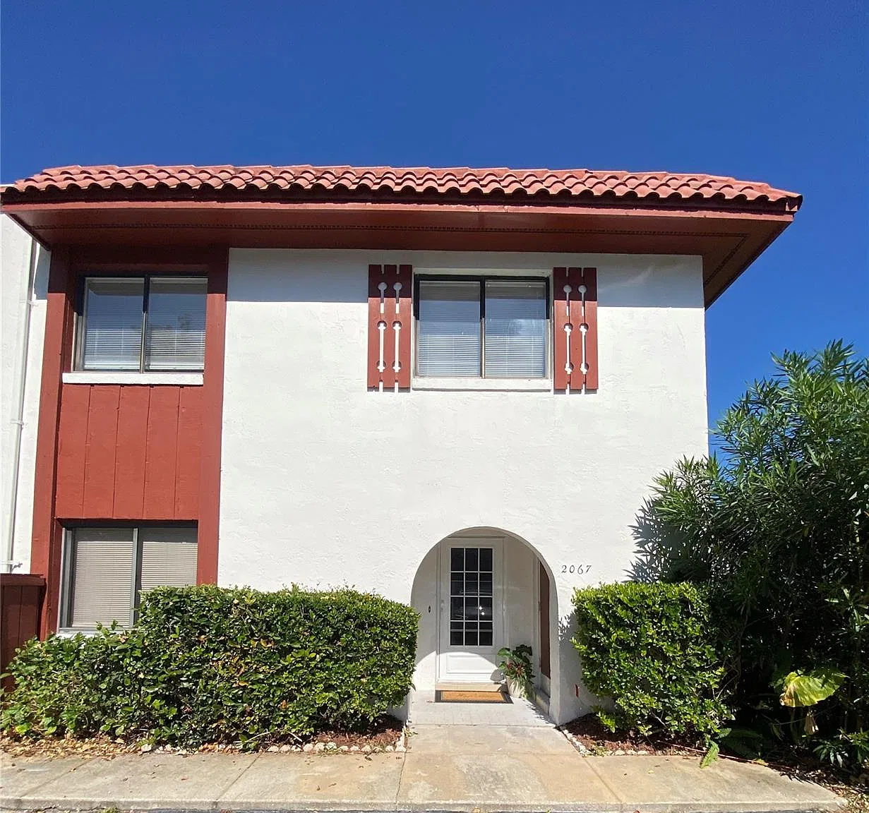 Remarkably rare large bedrooms, tons of storage & private patio. — Photo 1