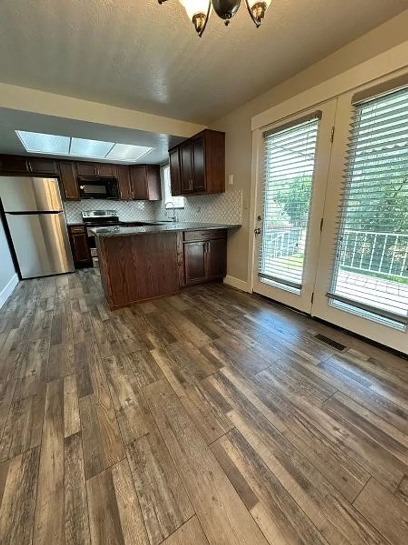 Light Up Your Summer 2 Weeks Rent Free! | Spacious 3 Bed, 2 Bath Home with RV Parking & Outdoor S... — Photo 3