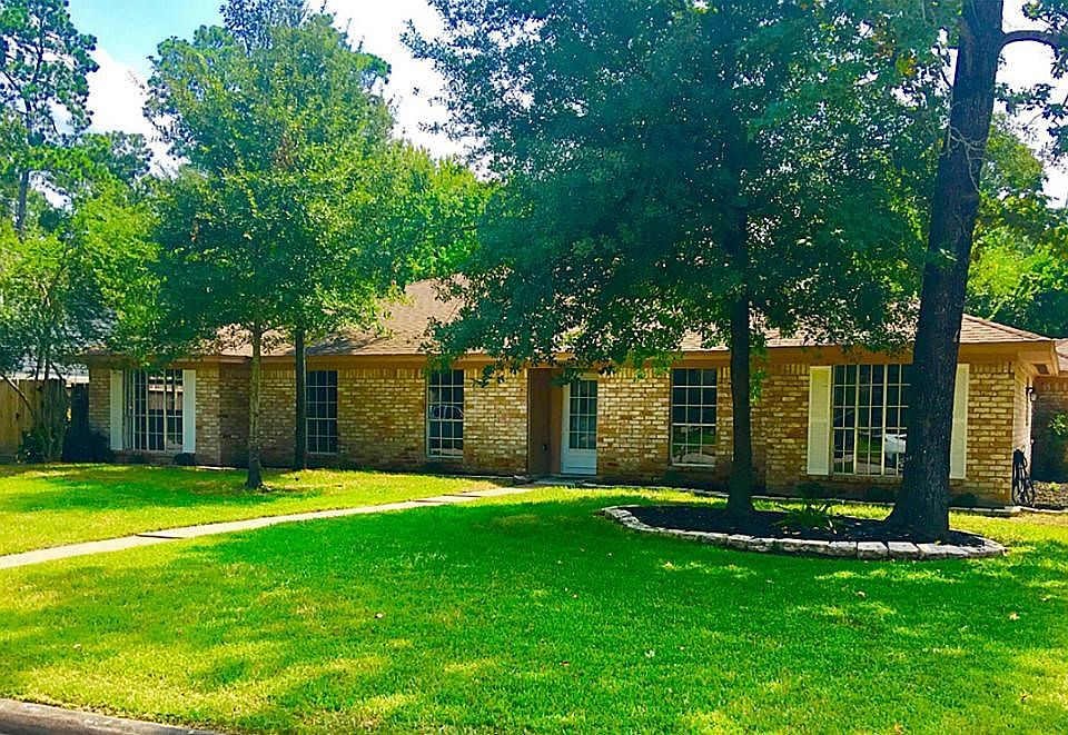 Traditional beauty on shaded lot with great modern updates