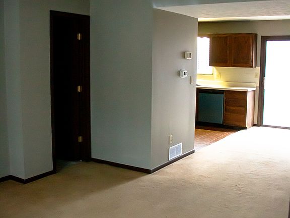 Living room into dining area and kitchen.