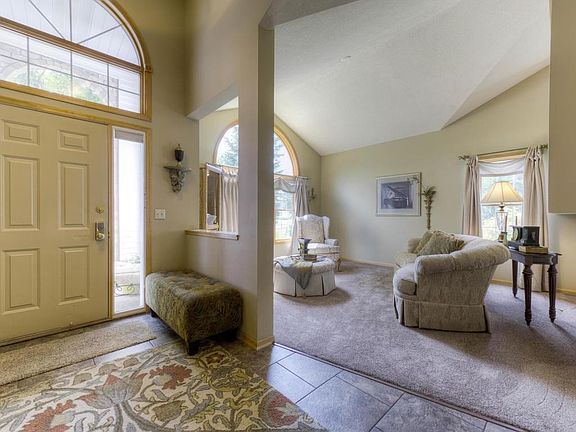Main floor foyer and view to the formal living room.