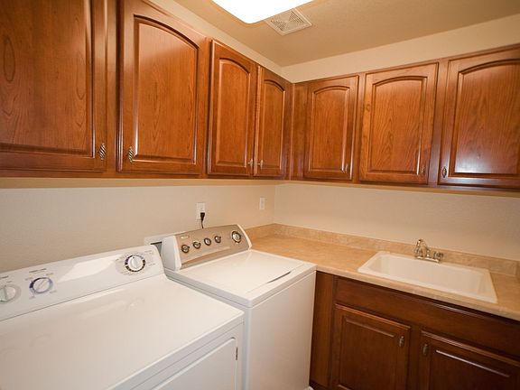 Upstairs Laundry Room With Sink, Washer and Dryer Included 