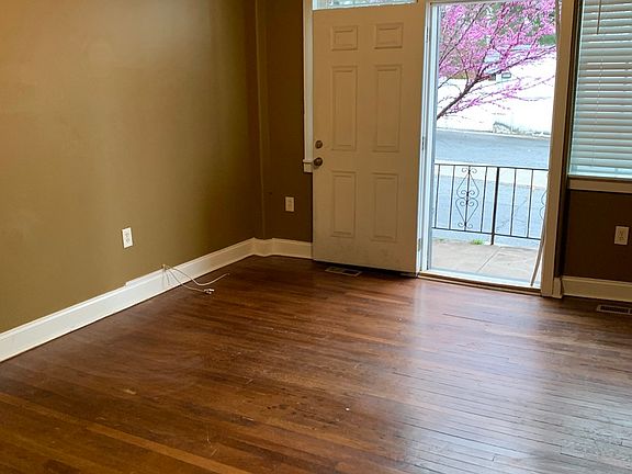 Living room with view of balcony facing Kennesaw Ave