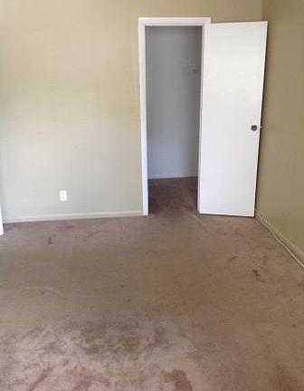 master bedroom view looking at walk-in in closet