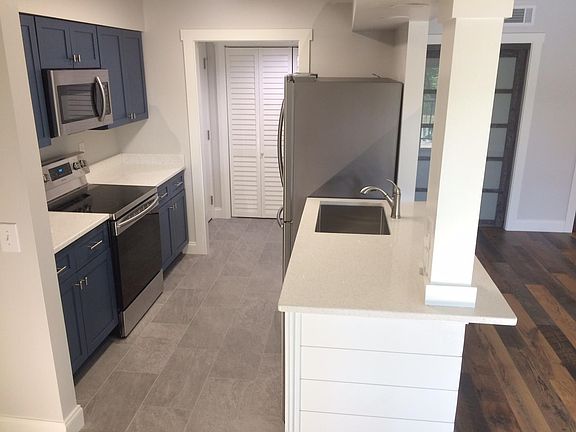 Kitchen and pantry closet (left of refrig)