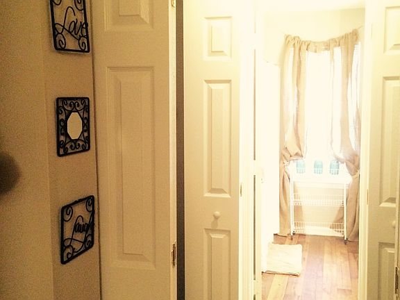 Master hallway with closets to bathroom