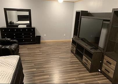 Property is not furnished property was staged to show how much room is available