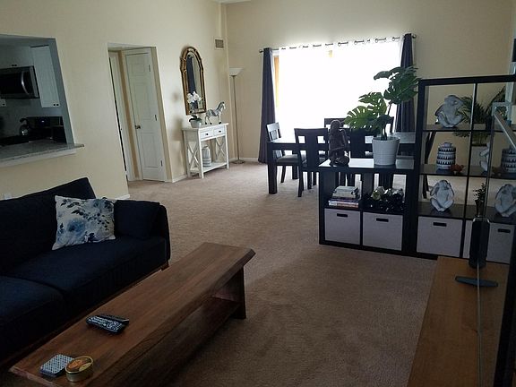 Open floor plan to kitchen and master bedroom.