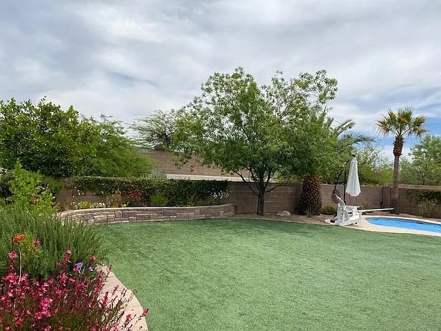 Backyard with artificial turf.