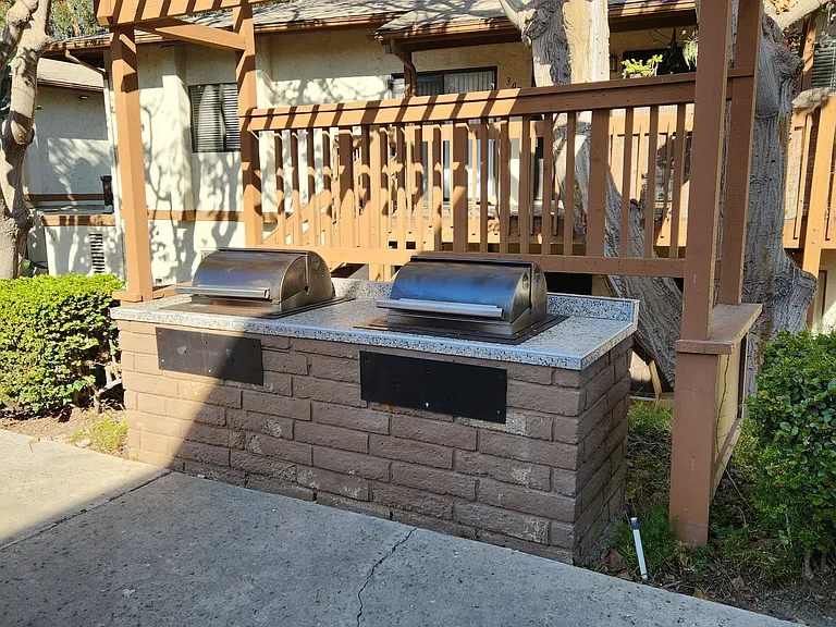 Barbeque grills (next to pool area)