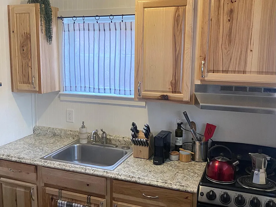 kitchen with fridge/freezer, stove