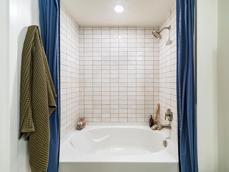 Spa-inspired bathrooms at Modera University Park offer a calm, polished retreat.