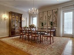 The Dining Room is classic with wainscoting and crown molding. (Sorry, the chandelier and sconces ar