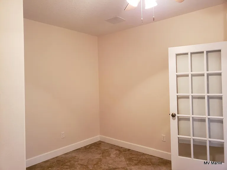Den, next to the kitchen