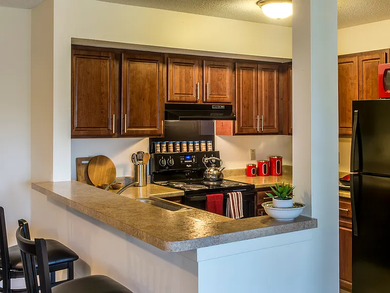 Kitchen Area With Barstools