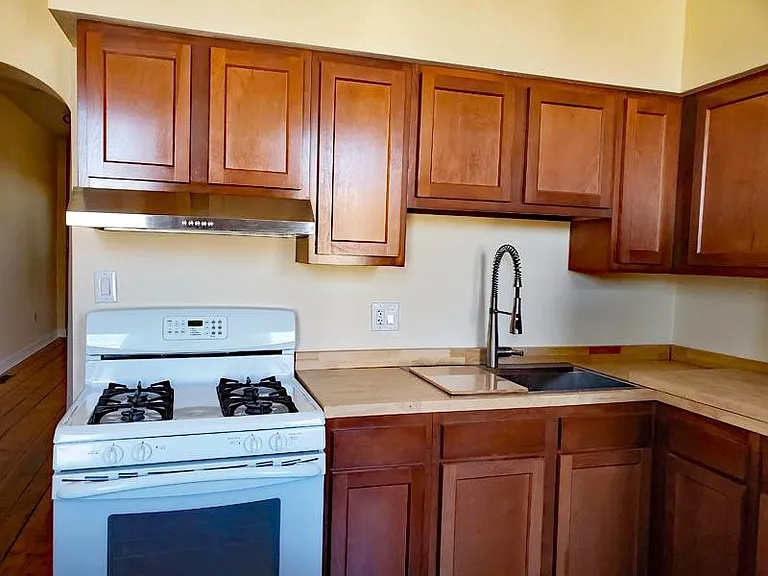 New sink
New counter tops
New cabinets
New range hood