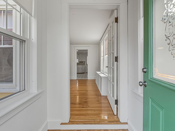 Enclosed front door entry for mudroom.