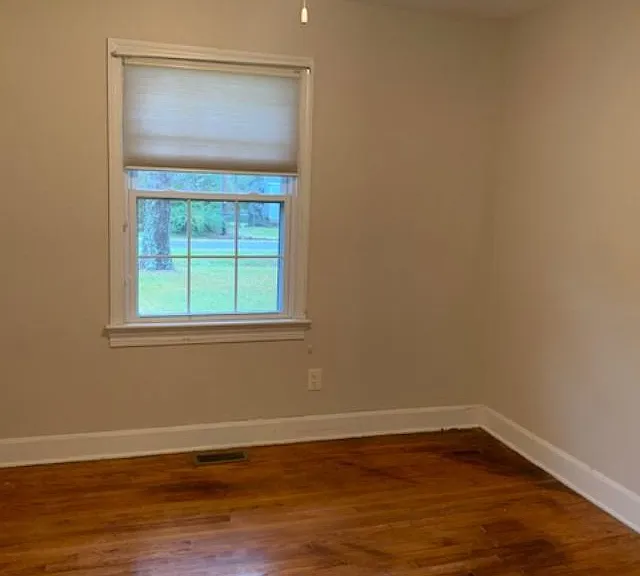 Cozy bedroom 1. New blinds and light fixture.