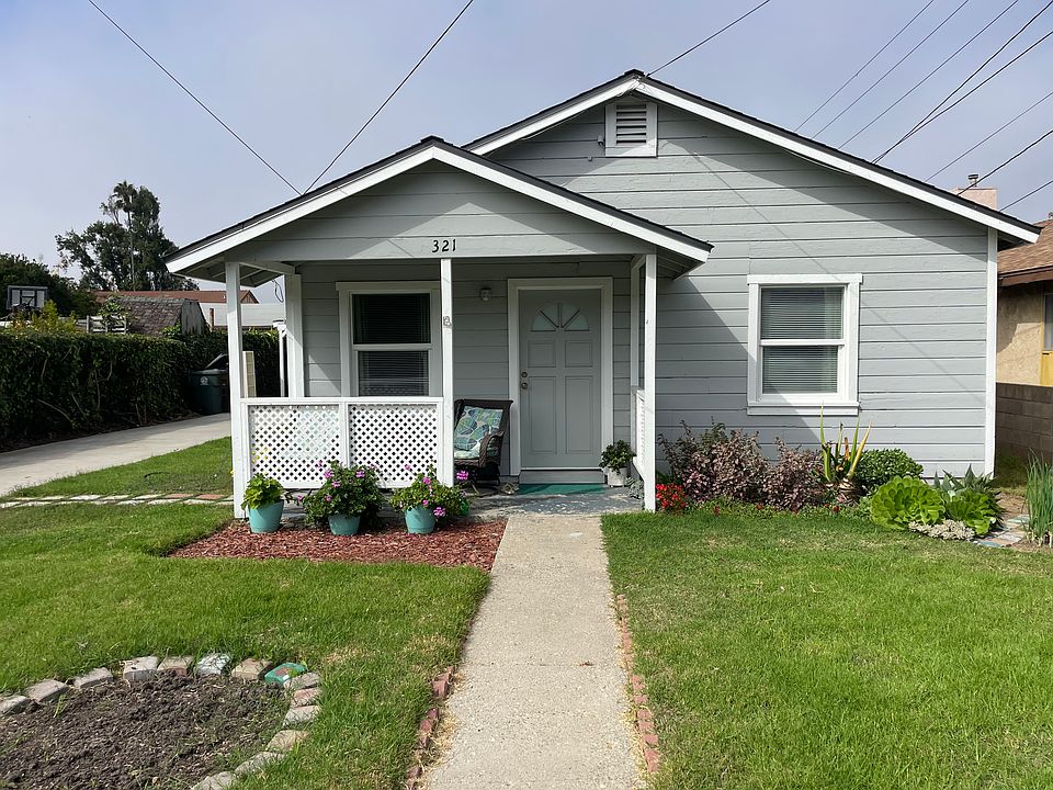 Front of the home with grassy yard