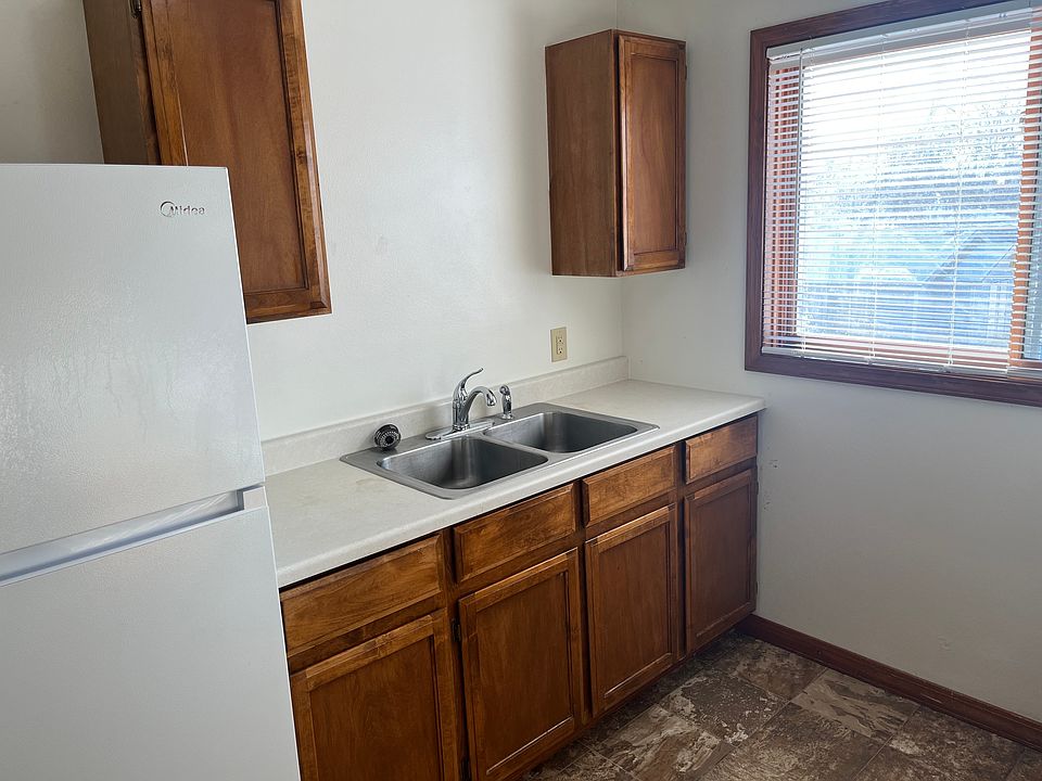 Photos are of a similar unit. Please call for a showing of the specific unit available. Spacious kitchen, plenty of storage.