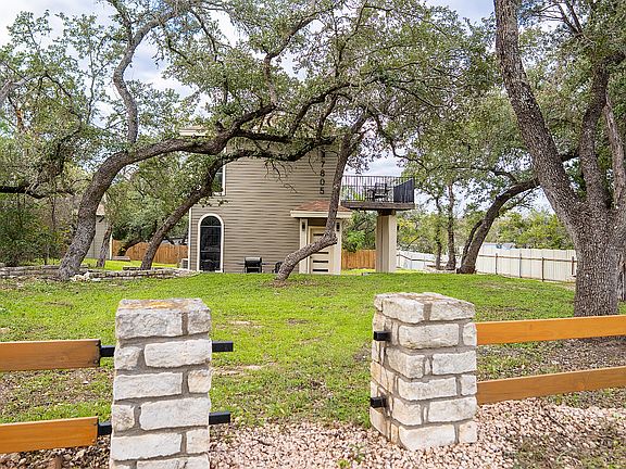 Front yard prior to fence built to enclose backyard