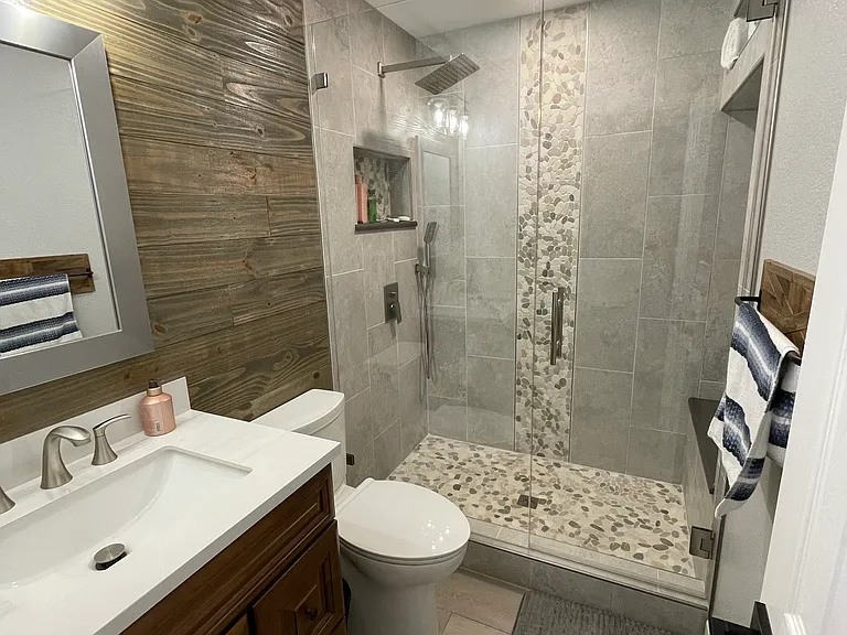 Newly remodeled bathroom with rainfall shower