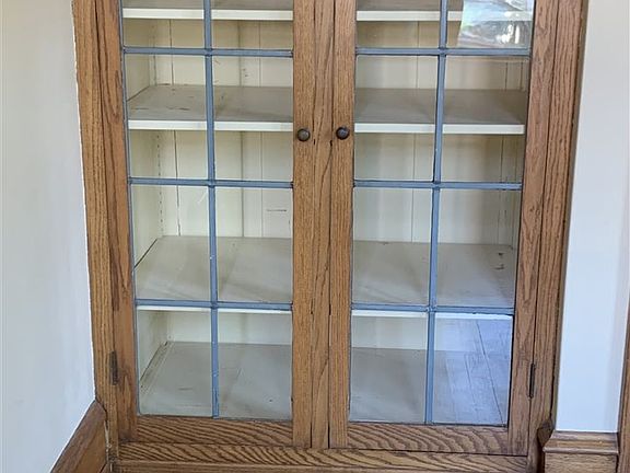 Leaded glass cabinet in office