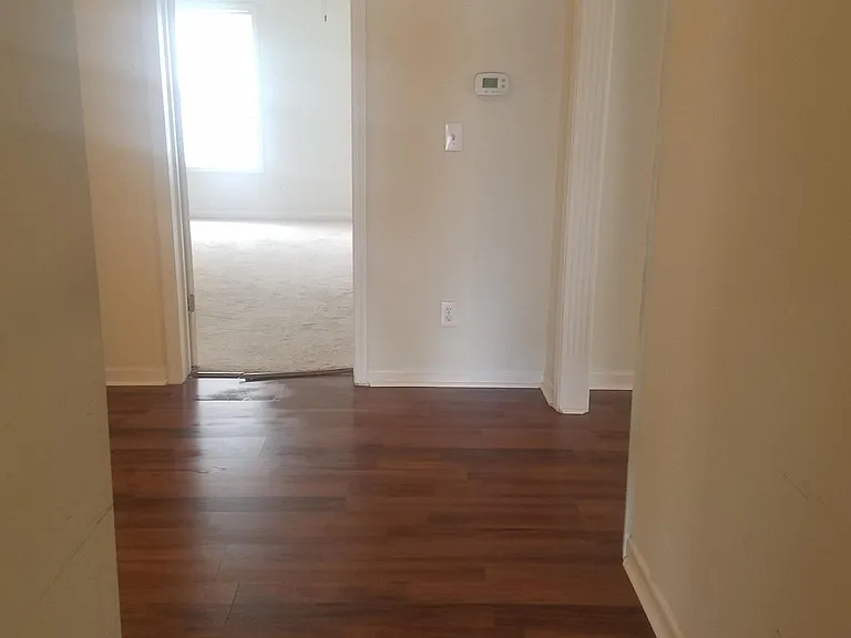 hallway to bedrooms, bathroom and laundry room