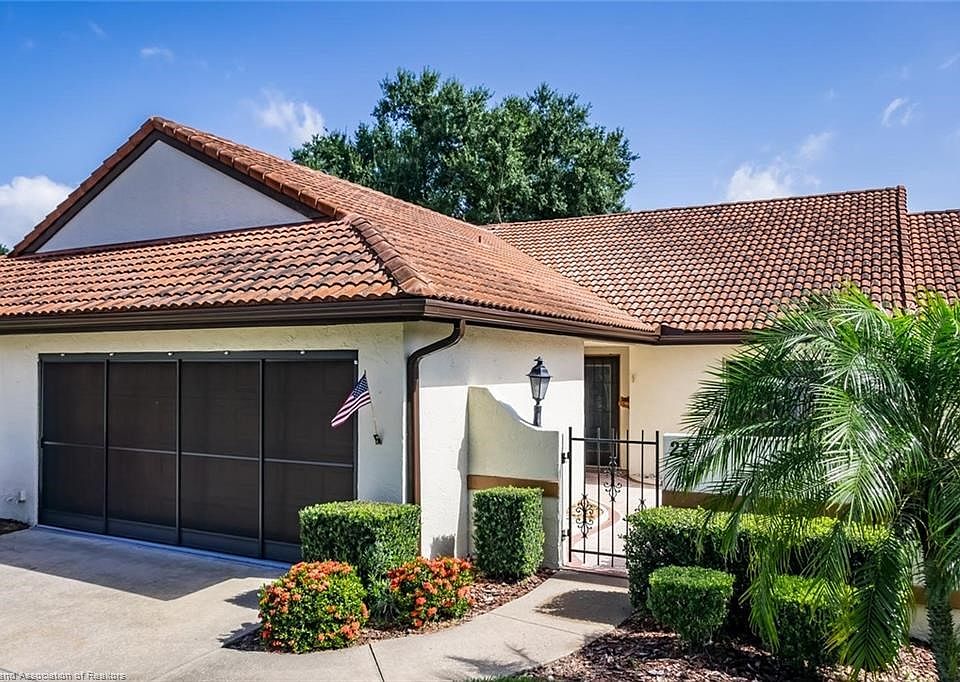 Frontal View w/ 2 car garage & front patio entrance