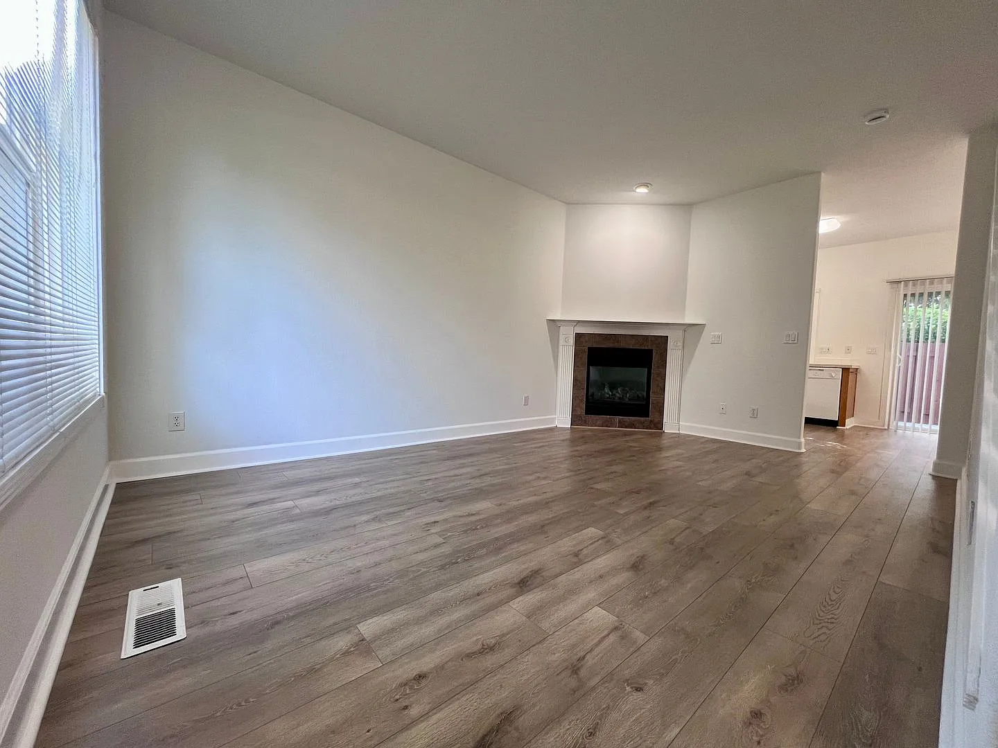 Move-In Special 1/2 Off First Month's Rent! Charming 3-Bedroom End-Unit Townhome With Attached Ga... — Photo 2