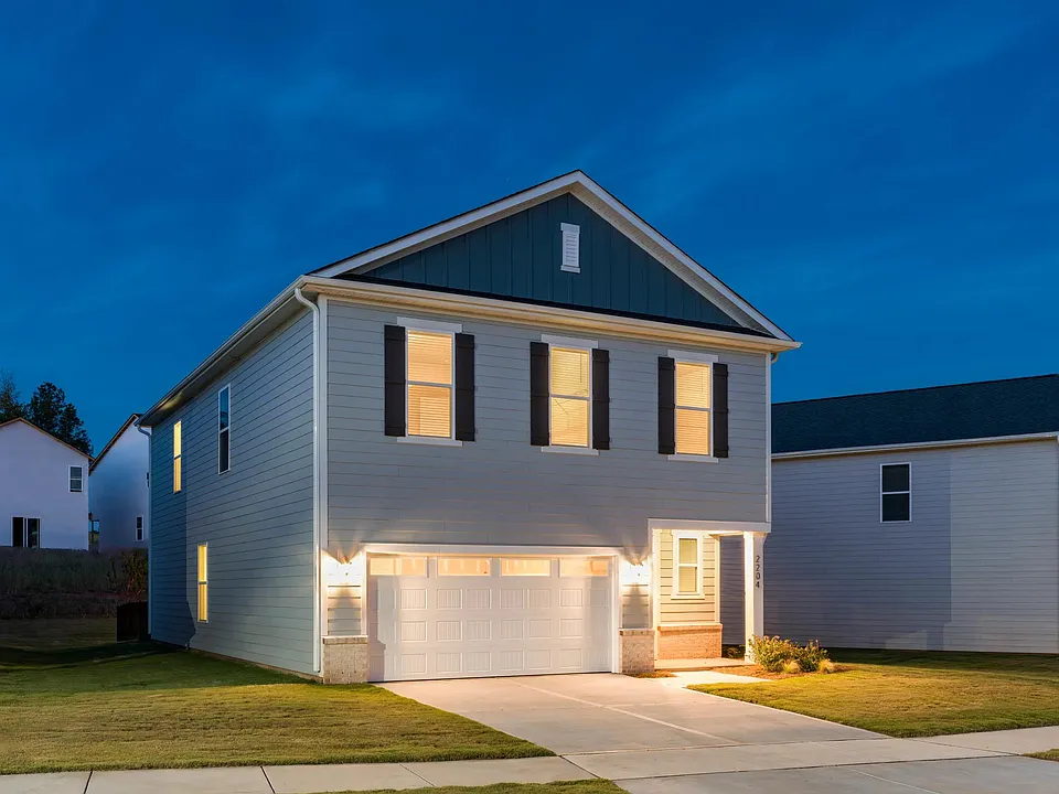 A private single-family home at Amavi Brier Creek, offering modern design, an attached garage, and a quiet Durham setting near Brier Creek conveniences.