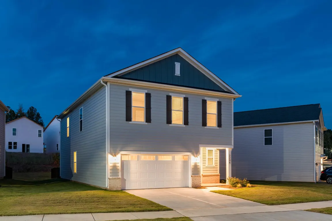 A private single-family home at Amavi Brier Creek, offering modern design, an attached garage, and a quiet Durham setting near Brier Creek conveniences.