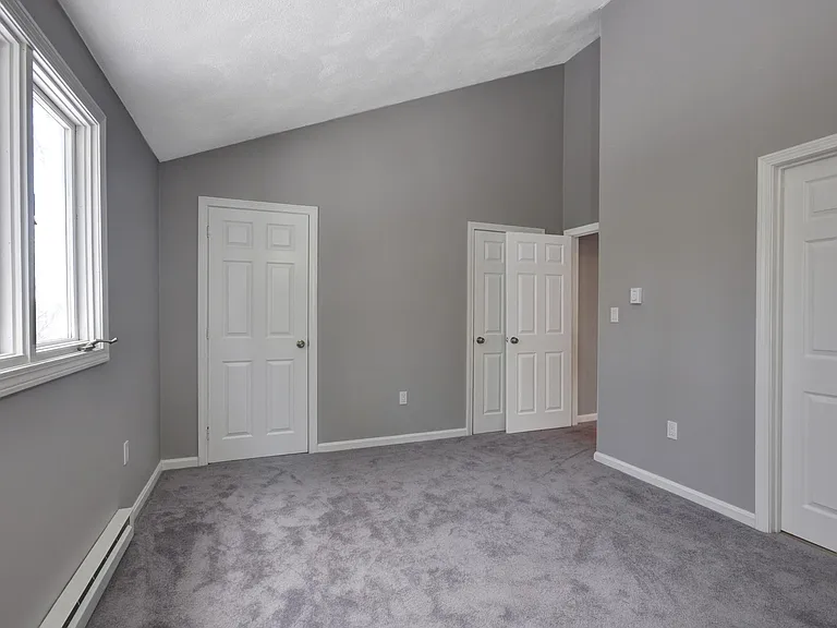 Bedroom 1 with dual closets
