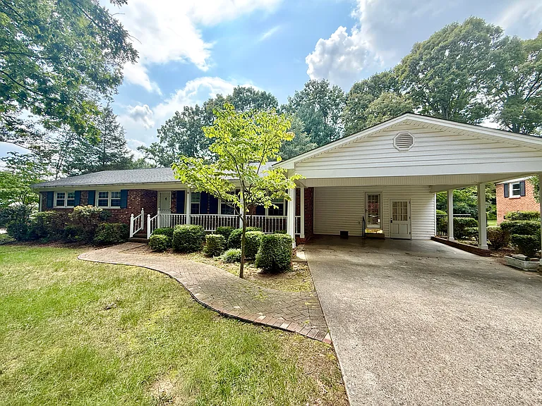 Front of Home with 2-Car Carport