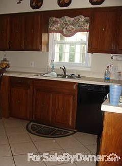 Living room
						:
						Huge living room with gas log fireplace and built-in bookshelves