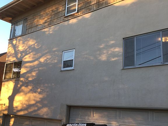 Garages and outside parking. Each unit has 1/2 of two car garage, plus one off street space.