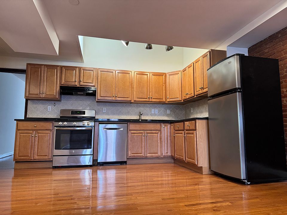 Kitchen - stove/oven, dishwasher, and fridge/freezer.