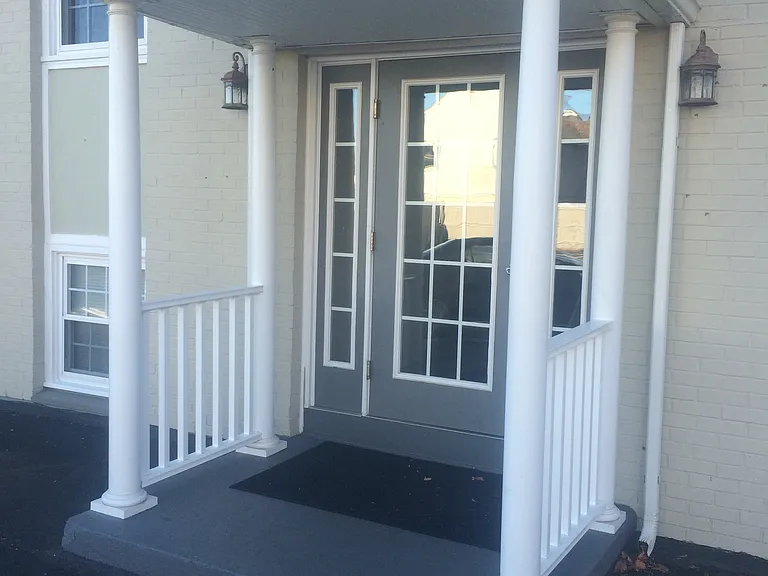 Rear entry off parking lot with your own parking space