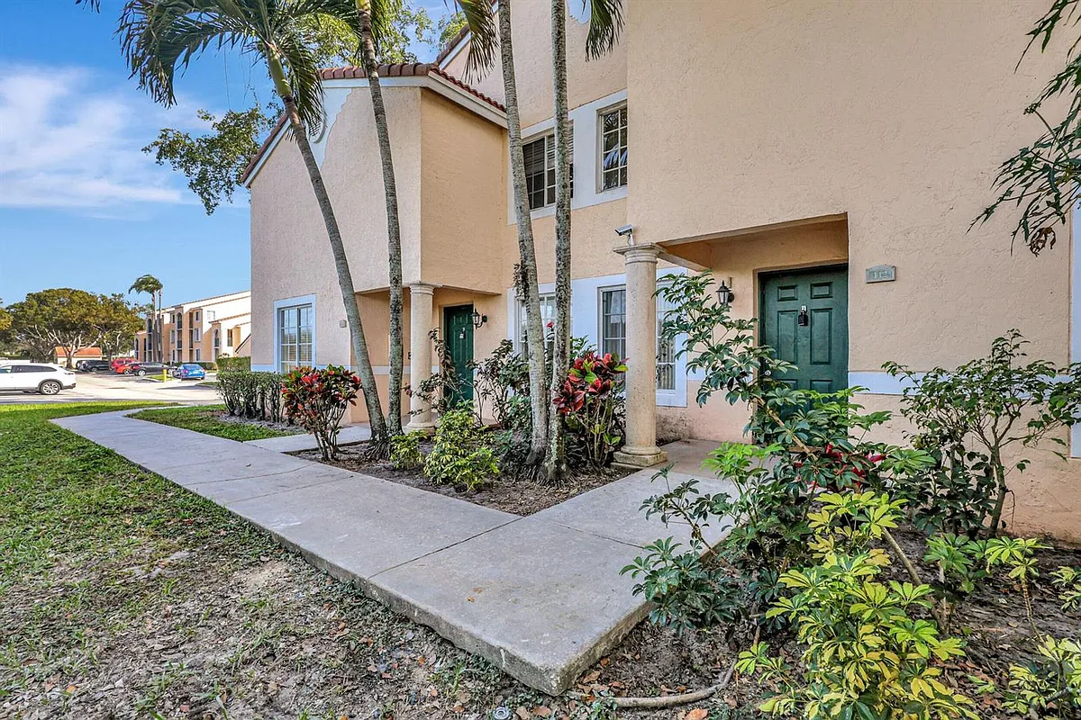 Building Photo - 1733 Village Blvd #112