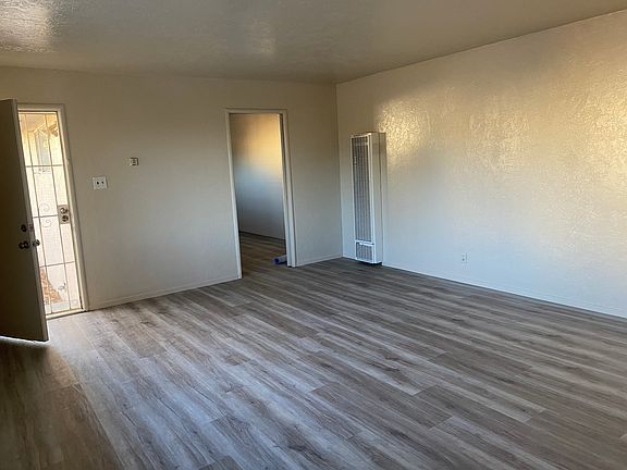 Living room with entrance into kitchen - pocket door for privacy