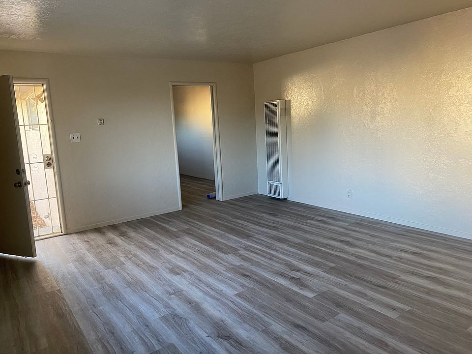 Living room with entrance into kitchen - pocket door for privacy
