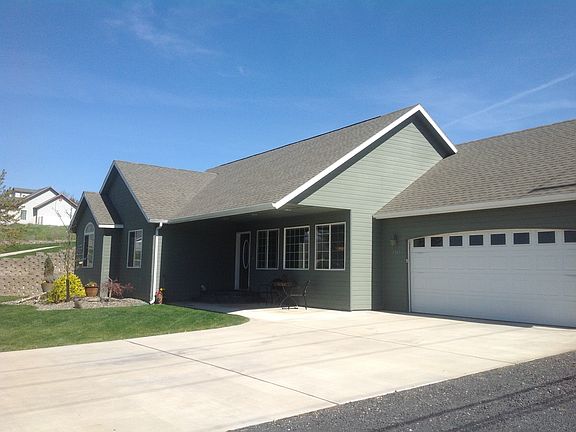 RV parking on side of garage