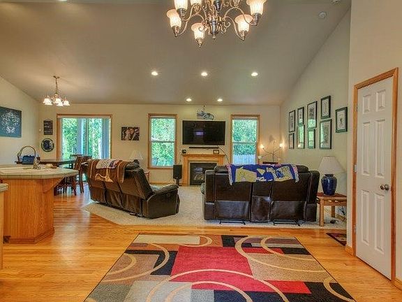 Grand entrance to vaulted, open great room living spaces; perfect for entertaining.  Home has air conditioning, too.