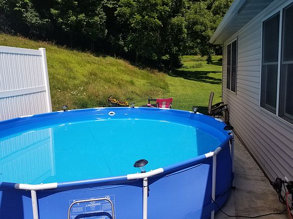 Cemented area w/privacy fence