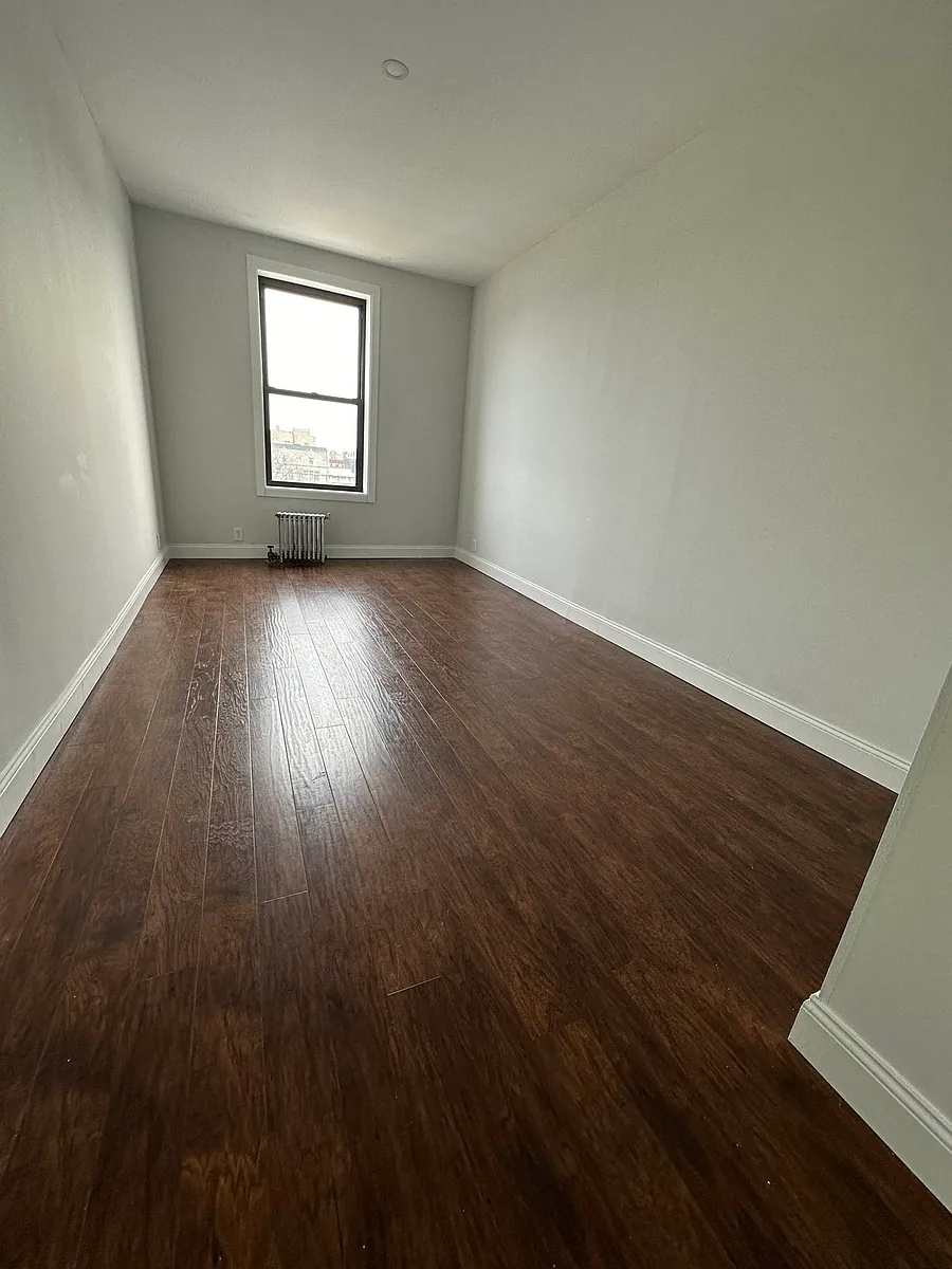 Building Photo - 86-22 Dongan Ave #6X