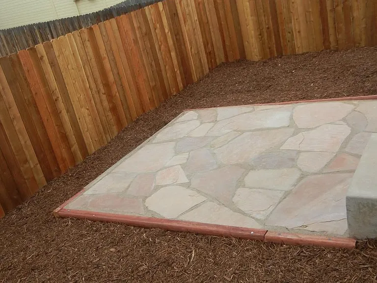 Flagstone area in private fenced patio