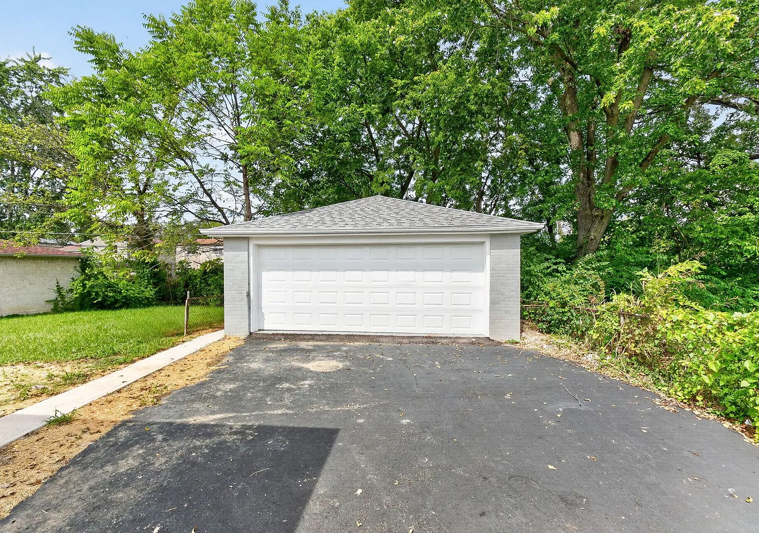 More Than Meets the Eye! Updated Home with Bonus Space & 2-Car Garage — Photo 4